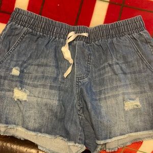 Distressed denim shorts